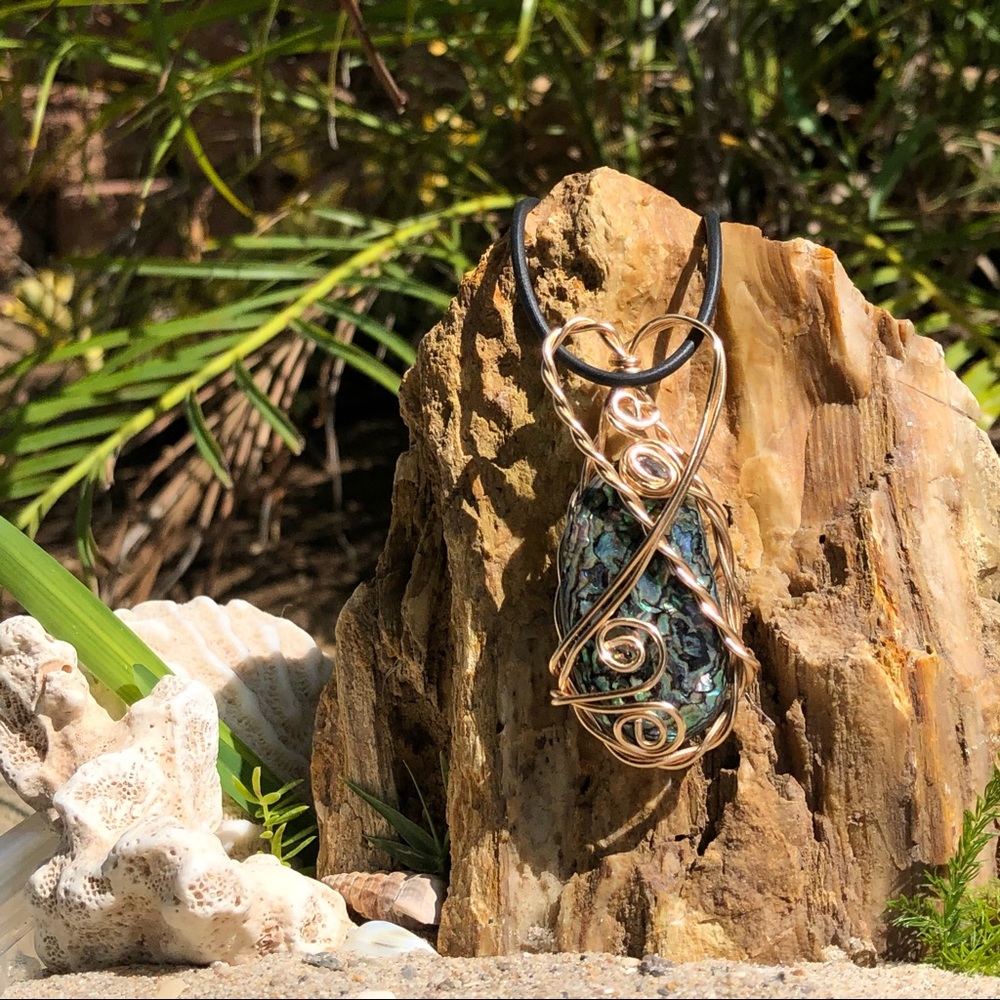 Abalone and gold toned copper wire wrap pendant.